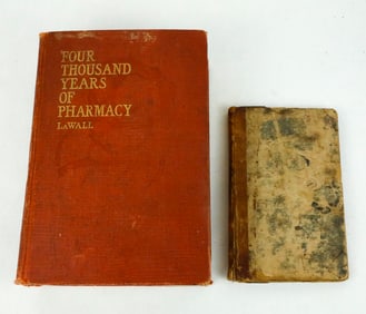 Two books: Four Thousand Years of Pharmacy, 1927, and a handwritten remedy/recipe journal titled