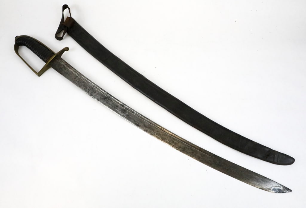 17th Century Australian European Sword Saber: 17th Century Australian European sword saber, revealing a short curved blade with engraved crowns on both blade sides, monogram brass guard and leather stacked handle. The steel blade shows minor dent