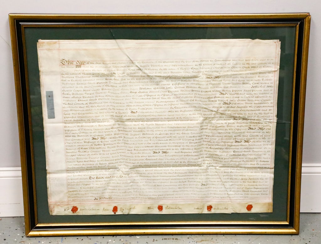 Large Framed English Document Circa 1770-1780: Large framed English document circa 1770-1780. The document is written on possibly vellum, with iron gall ink. It features multiple seals on the bottom, and a British embossed blue revenue stamp. It a