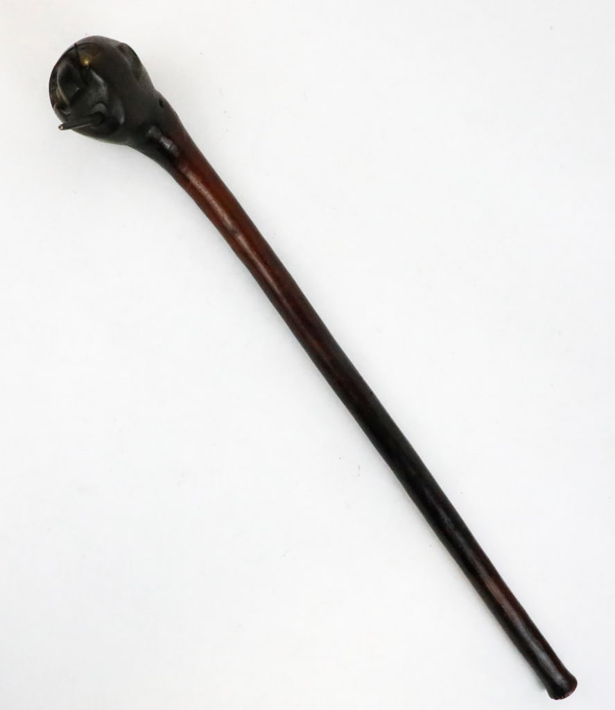 Zulu Hand-Carved Club With Bronze: Hand-carved Zulu club, originating from the people of South Africa. Possibly used in a ceremonial context, or warfare. Objects such as this, represent rank, power, and ancestral connection. Featuring,
