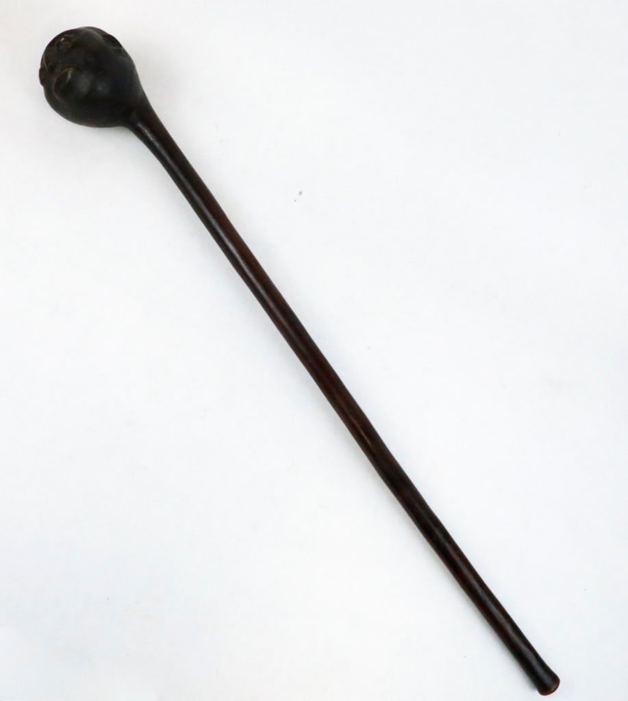 Zulu Hand-Carved Club: Large hand-carved Zulu club, originating from the people of South Africa. Possibly used in a ceremonial context, or warfare. Objects such as this, represent rank, power, and ancestral connection. Feat