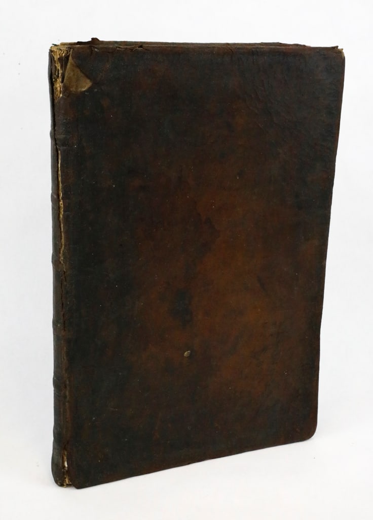 A Collection of the Statutes Made in the Reigns of King Charles the I and King Charles the II, 1667.: A Collection of the Statutes Made in the Reigns of King Charles the I and King Charles the II, by Manby of Lincolns-Inn, Esq., printed 1667, London. Dark brown leather cover shows cracking, stains, an