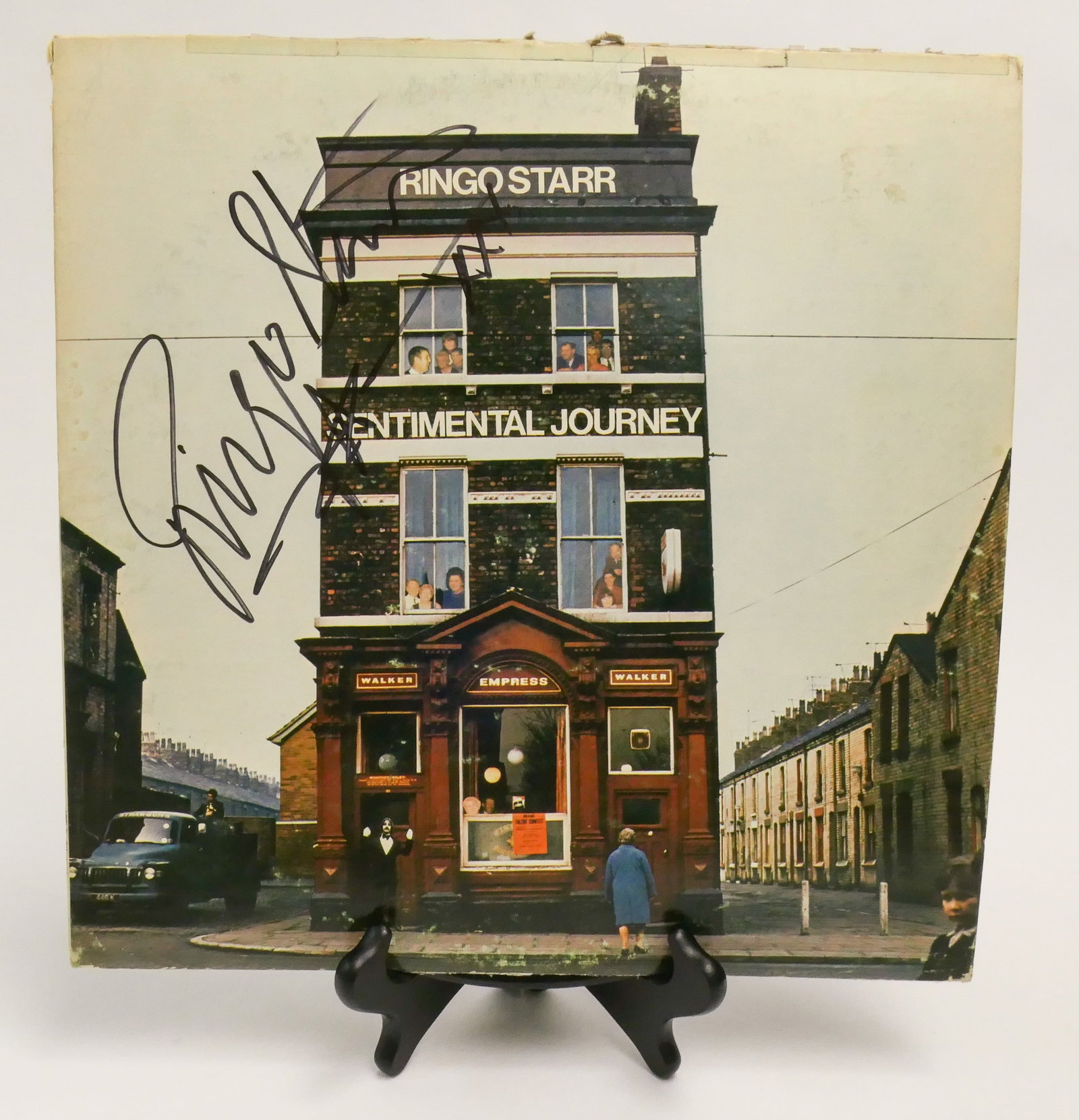 Signed Sentimental Journey Album: Signed copy of Ringo Starr, Sentimental Journey (pressed by Apple Records), containing the 33RPM vinyl record. This signature has not been authenticated. The bottom of the sleeve shows a tear.