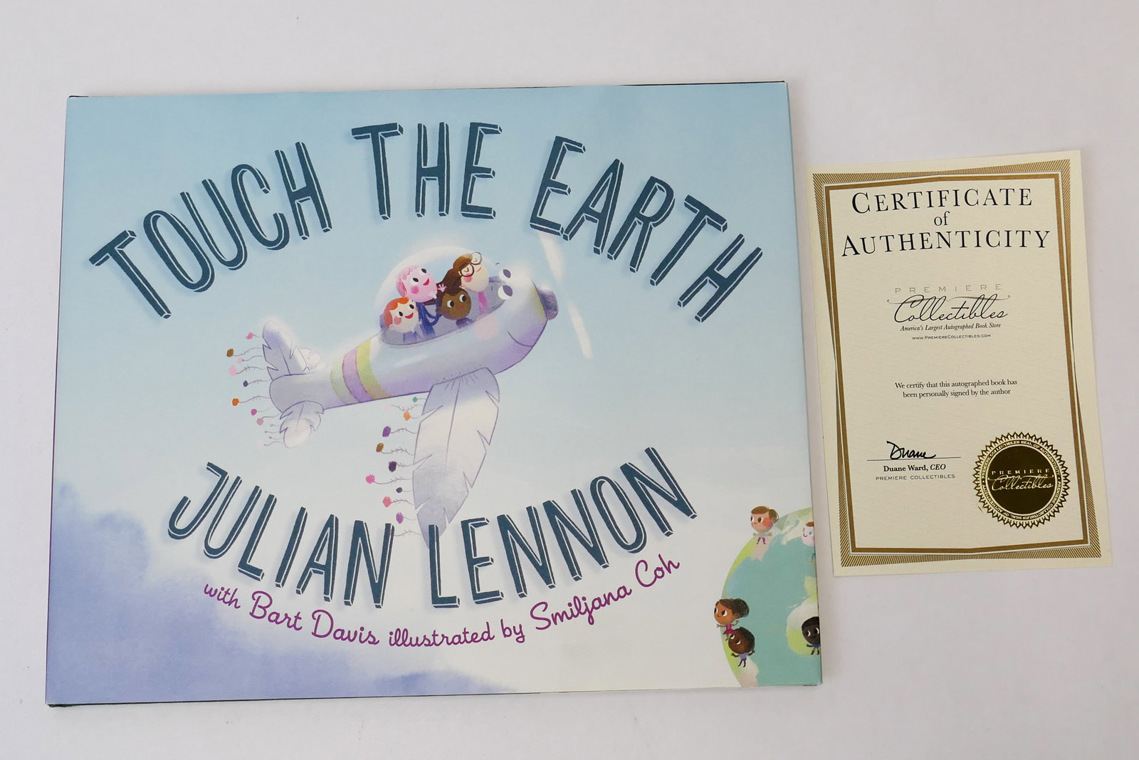 Signed Copy of Touch The Earth by Julian Lennon (1 of 4)