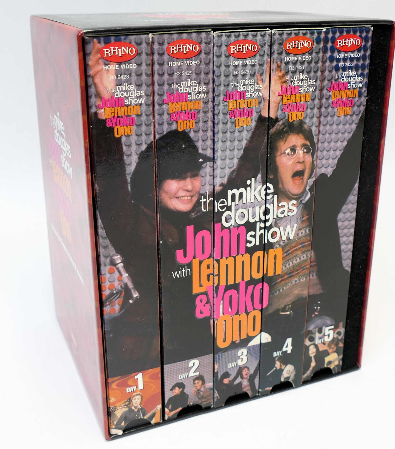 Lennon and Yoko Mike Douglas VHS Set: Set of five VHS tapes for The Mike Douglas Show featuring John Lennon and Yoko Ono: Five Days That Changed The Course of Television, with a small companion book.