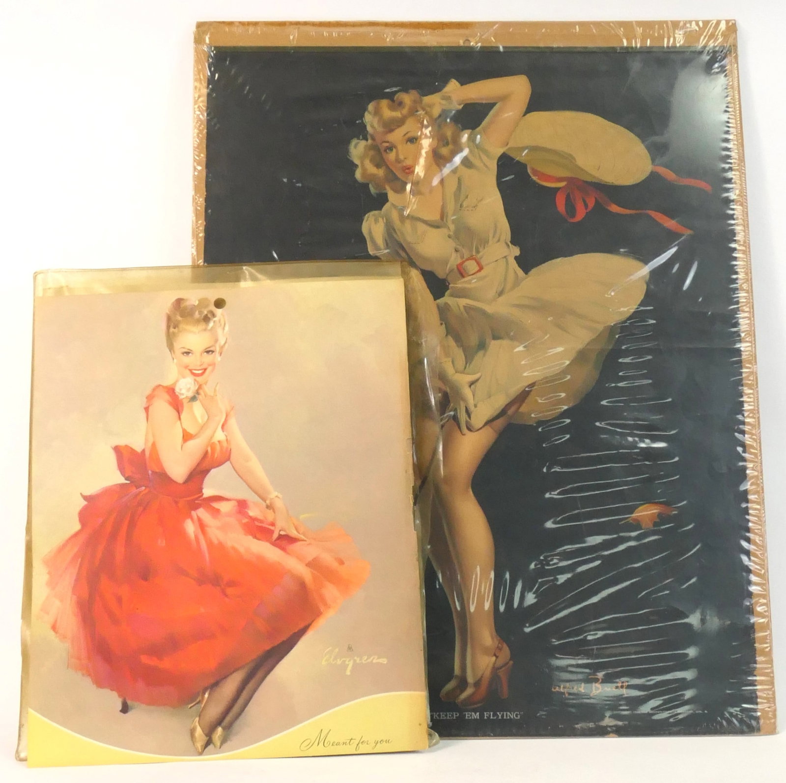 Two Pinup Illustration Prints: Two pinup illustration prints titled Meant For You, and Keep 'Em Flying. One is shrink wrapped on cardboard, the other has a plastic wrapping. One is by Gil Elvgren, and the other is signed in the pla
