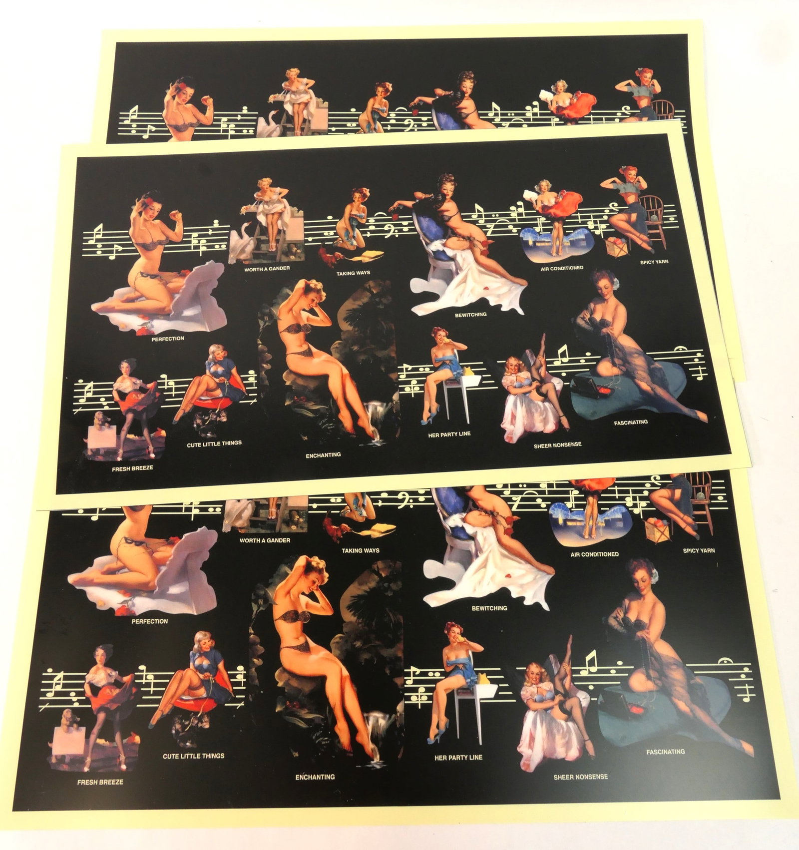 Elvgren Pinup Placemats: Set of four placemats featuring numerous motifs of Gil Elvgren pinup illustrations. Size: 20.5"w x 12"l