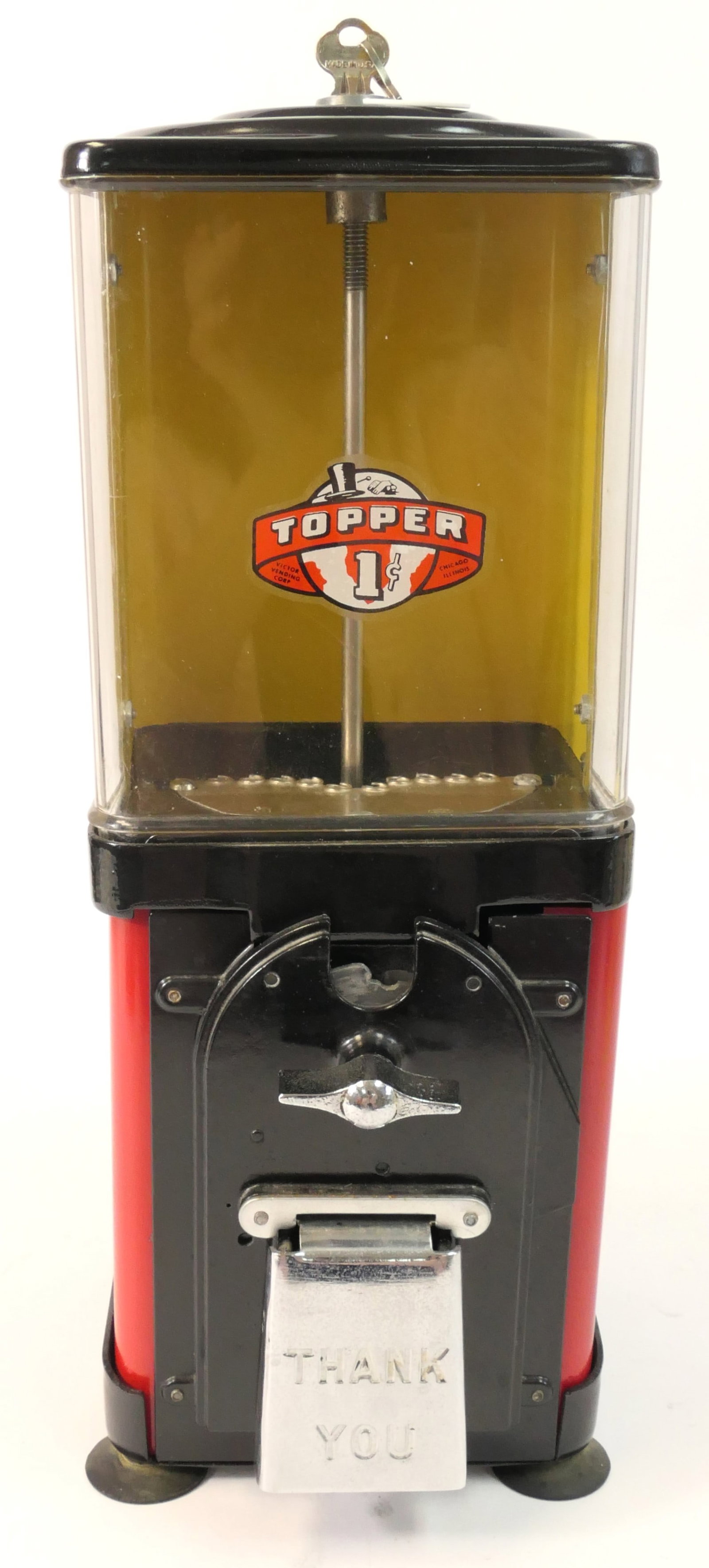 Topper Countertop Gumball Machine: Countertop gumball or candy machine featuring a decal for Topper One-Cent, and 'Thank You' on the collection door. The key for the upper lid is included, and removes the top half of the machine. This