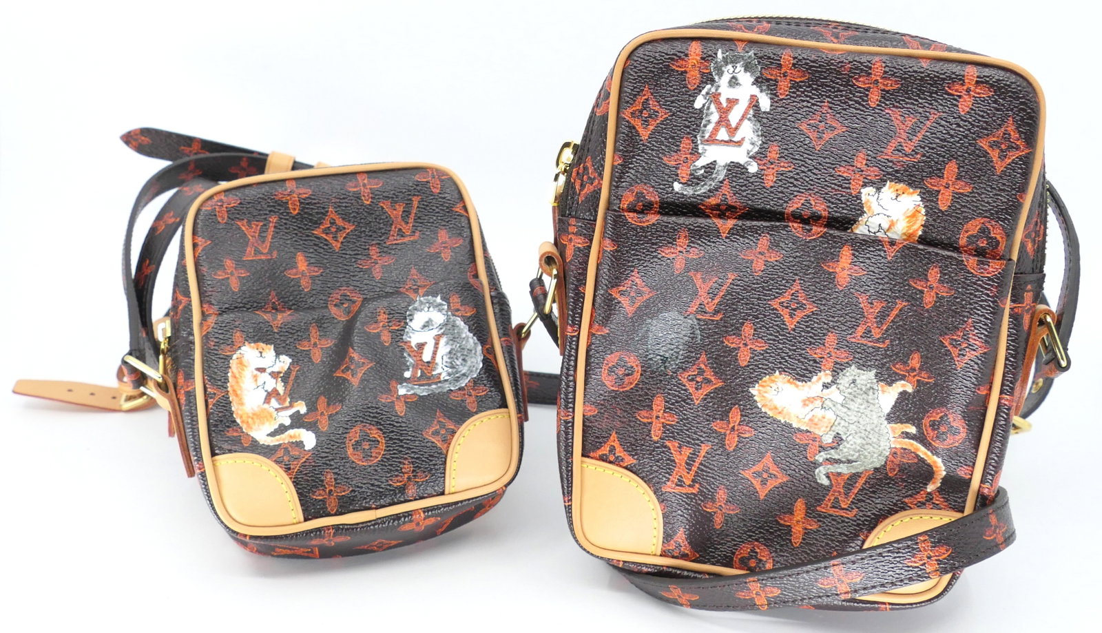 Louis Vuitton X Grace Coddington Paname Catogram Crossbody Bag Set: Louis Vuitton X Grace Coddington Paname Catogram Crossbody bag set of two with charming animal lining, 2018. Serial # RI4138. Excellent condition. Size: 5.5"w x 1.5"d x 7"h
