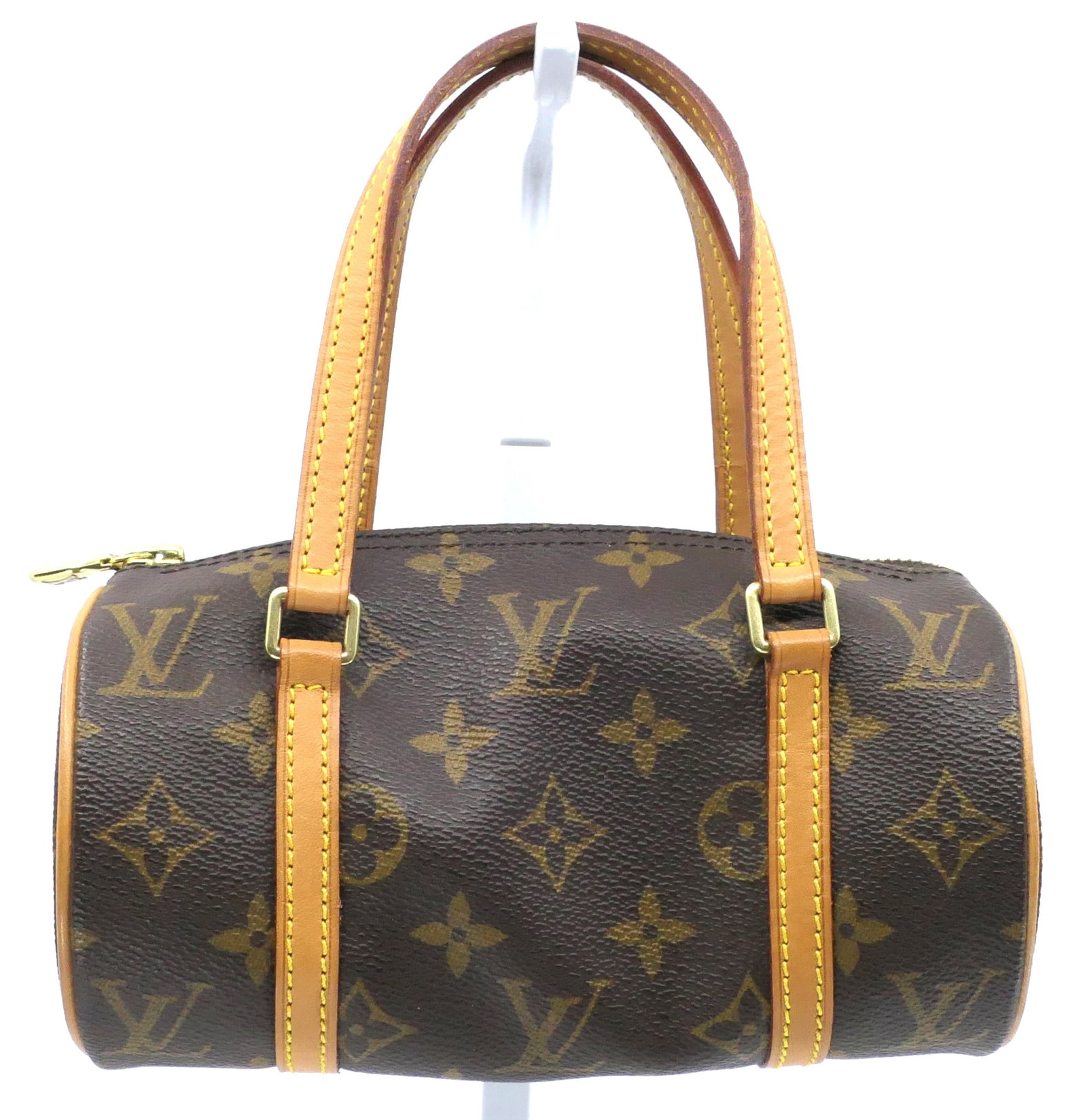 Louis Vuitton Papillon 19 Bag in Monogram Canvas: Louis Vuitton Papillon 19 bag in classic monogram canvas with vachetta leather trim, gold tone hardware and fabric interior, 2003. Serial # DU0023. Excellent condition. Size: 7.5"w x 4"h