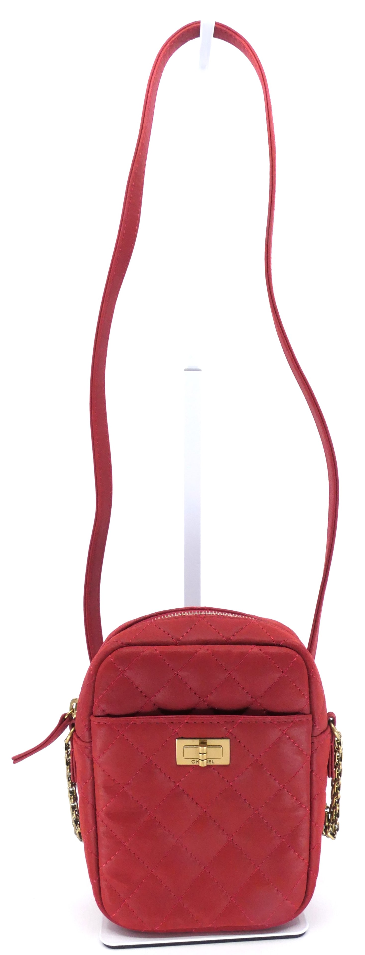 Chanel Red Quilted Camera Bag: Chanel red quilted crossbody camera bag with embellished brushed gold hardware, 2016. Sticker and card 22506936. Excellent condition. Size: 5.5"w x 2"d x 7"h