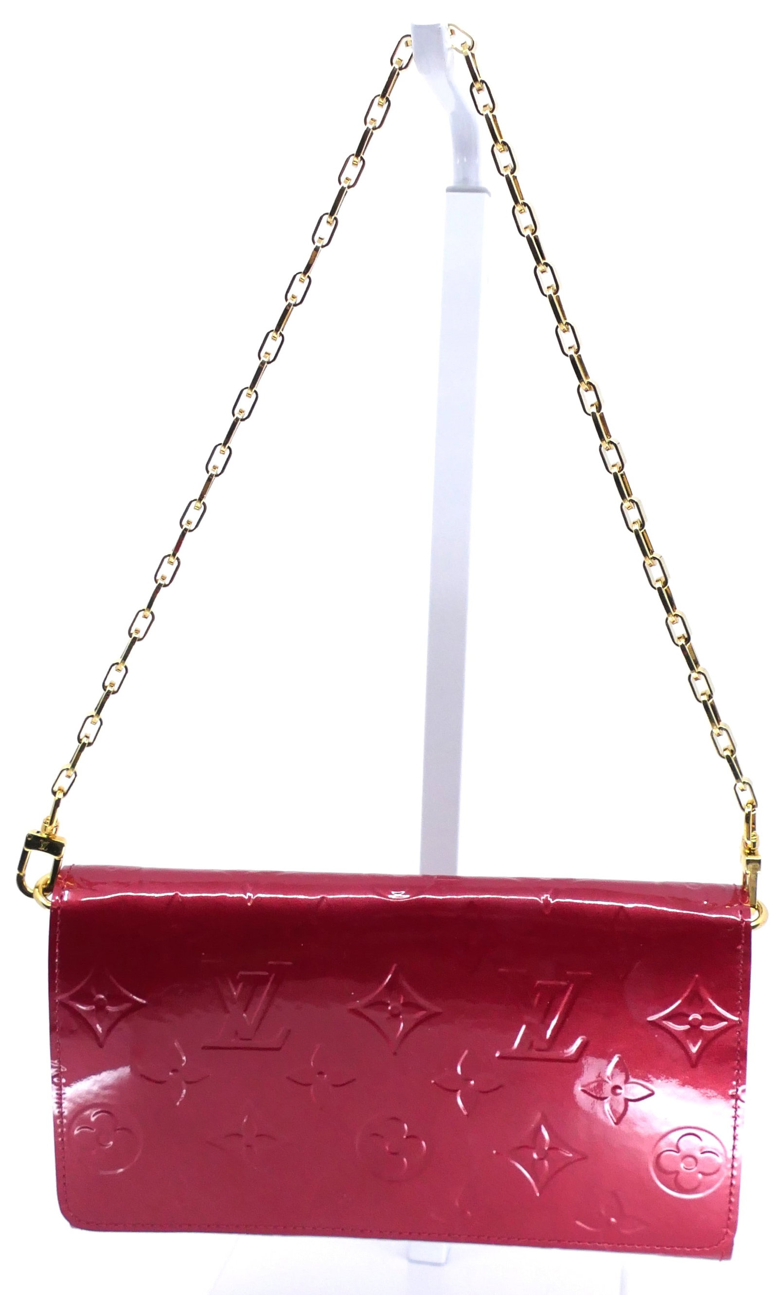 Louis Vuitton Sarah Vernis: Louis Vuitton Sarah wallet on chain Vernis in Pomme D'Amour imprinted leather with structured silhouette, 2014. Serial # TN0184. Excellent condition. Size: 7.5"w x 1"d x 4.25"h