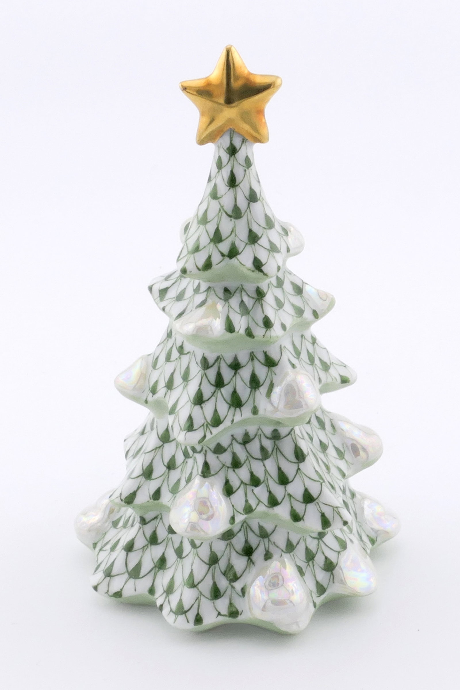 Herend Christmas Tree Figurine: Marked Herend porcelain figurine featuring a Christmas tree design in forest green fishnet patterning. Marked on the bottom Herend, Hungary. Excellent condition. Size: 2.25"dia x 4"h Location: Living