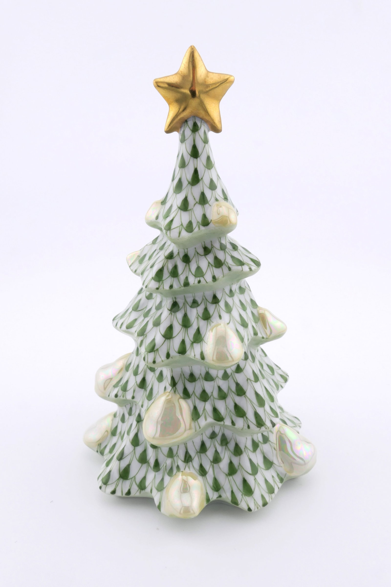 Herend Christmas Tree Figurine: Marked Herend porcelain figurine featuring a Christmas tree design in forest green fishnet patterning. Marked on the bottom Herend, Hungary. Excellent condition. Size: 2.25"dia x 4"h Location: Living