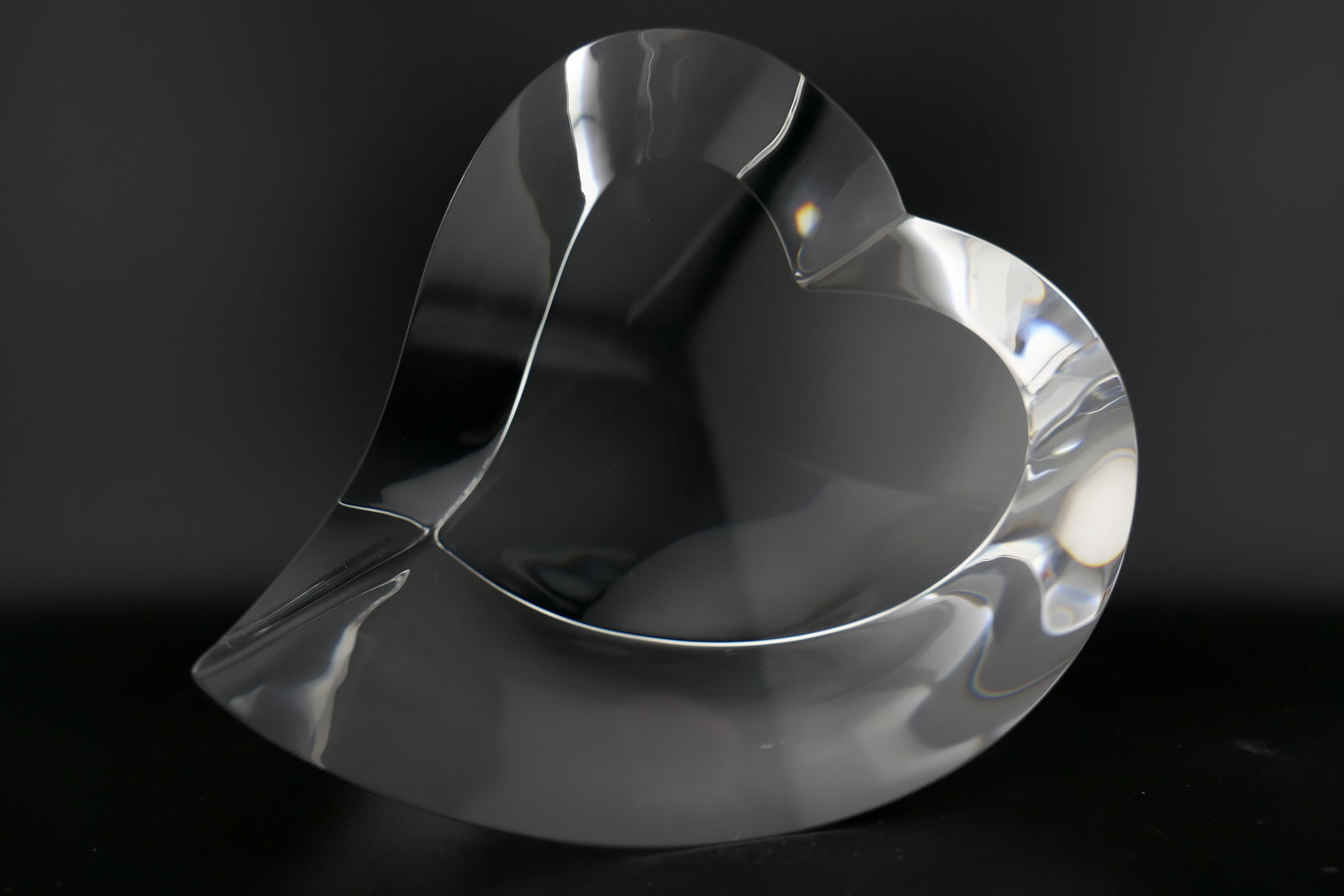 Steuben Crystal Heart Paperweight: Marked Steuben crystal paperweight featuring a heart design. Etched on the edge Steuben. Excellent condition. Size: 2.75"w x 4"d x 3.25"h Location: Living Room