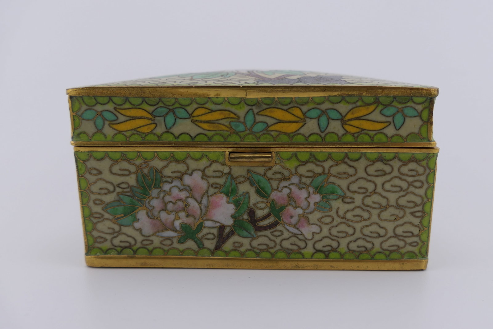 Floral Cloisonne Trinket Box: Hand made Chinese floral trinket box in floral cloisonne motifs. Includes original tag for the China Cloisonne Co, and shows a deep cobalt interior enamel finish. Very good condition, with some