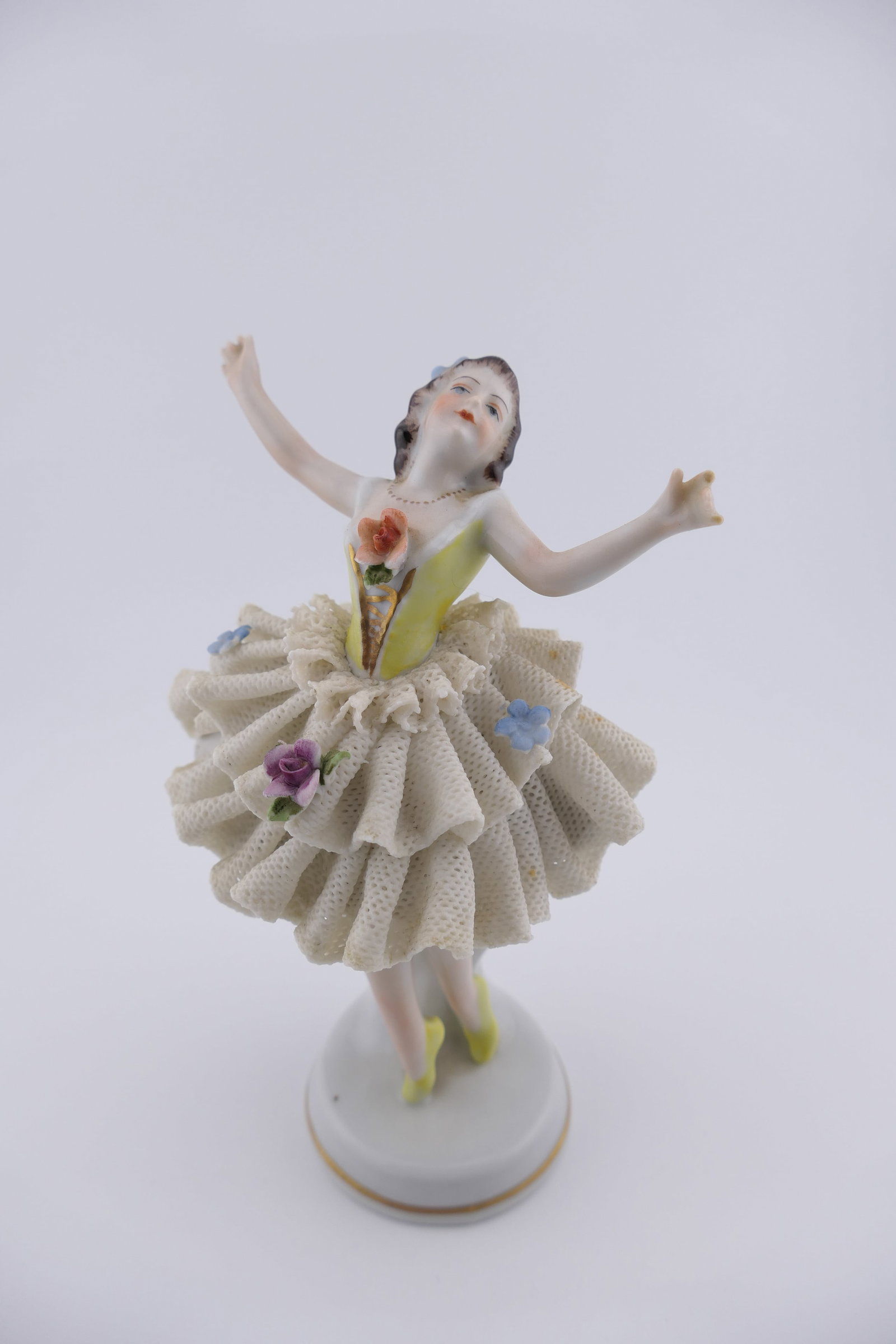 Dresden Lace Ballerina: Dresden porcelain lace figurine by Sitzendorf Porcelain, Germany, in the form of a dancing ballerina. Marked on the bottom Sitzendorf, Germany. Very good condition, with a small section of cracked