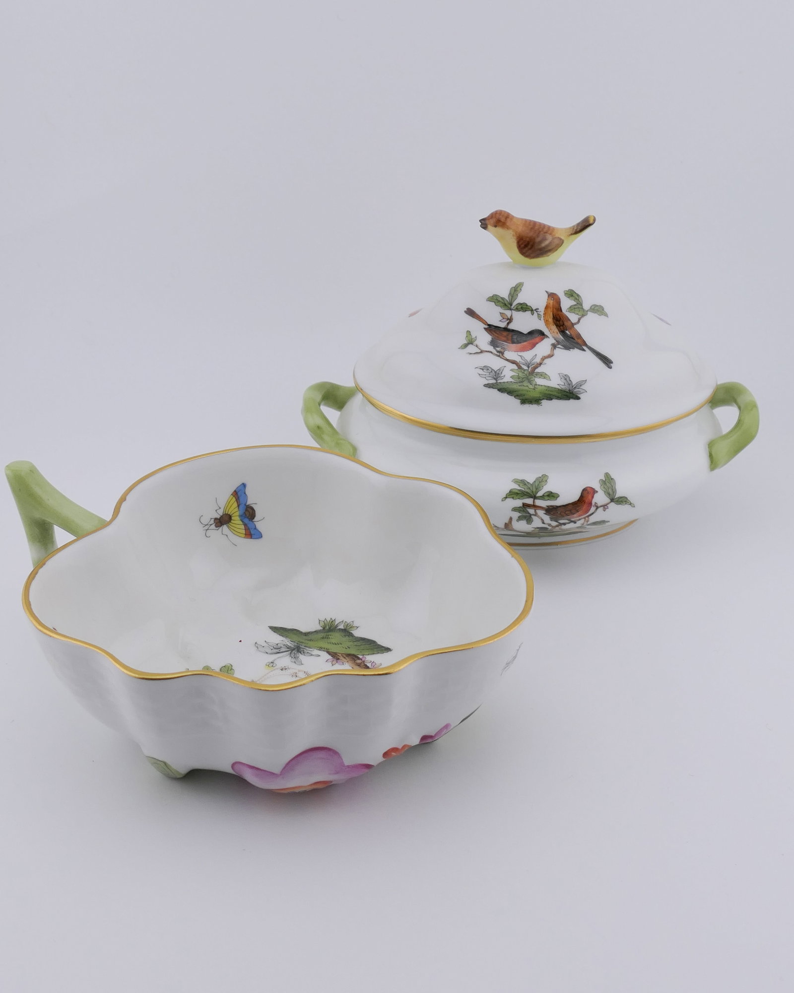 Herend Porcelain Bowl and Mini Tureen: Herend Hungary porcelain bowl and mini tureen marked #6017, RO and #8725, RO. Excellent condition. Size: 5.5"w x 3.5"d x 4"h Location: Living Room