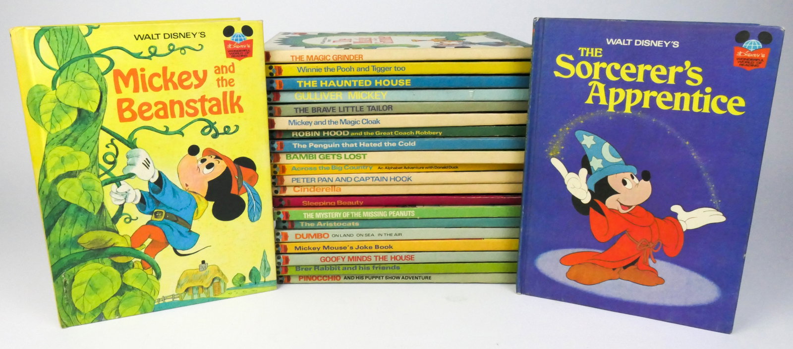Collection of Hardback Books from Walt Disney's Wonderful World of Reading Series: Collection of hardback books from Walt Disney's Wonderful World of Reading series, 22 total, including Cinderella, Pinocchio, Dumbo, Robin Hood, and more. Sleeping Beauty has a sticker inside.