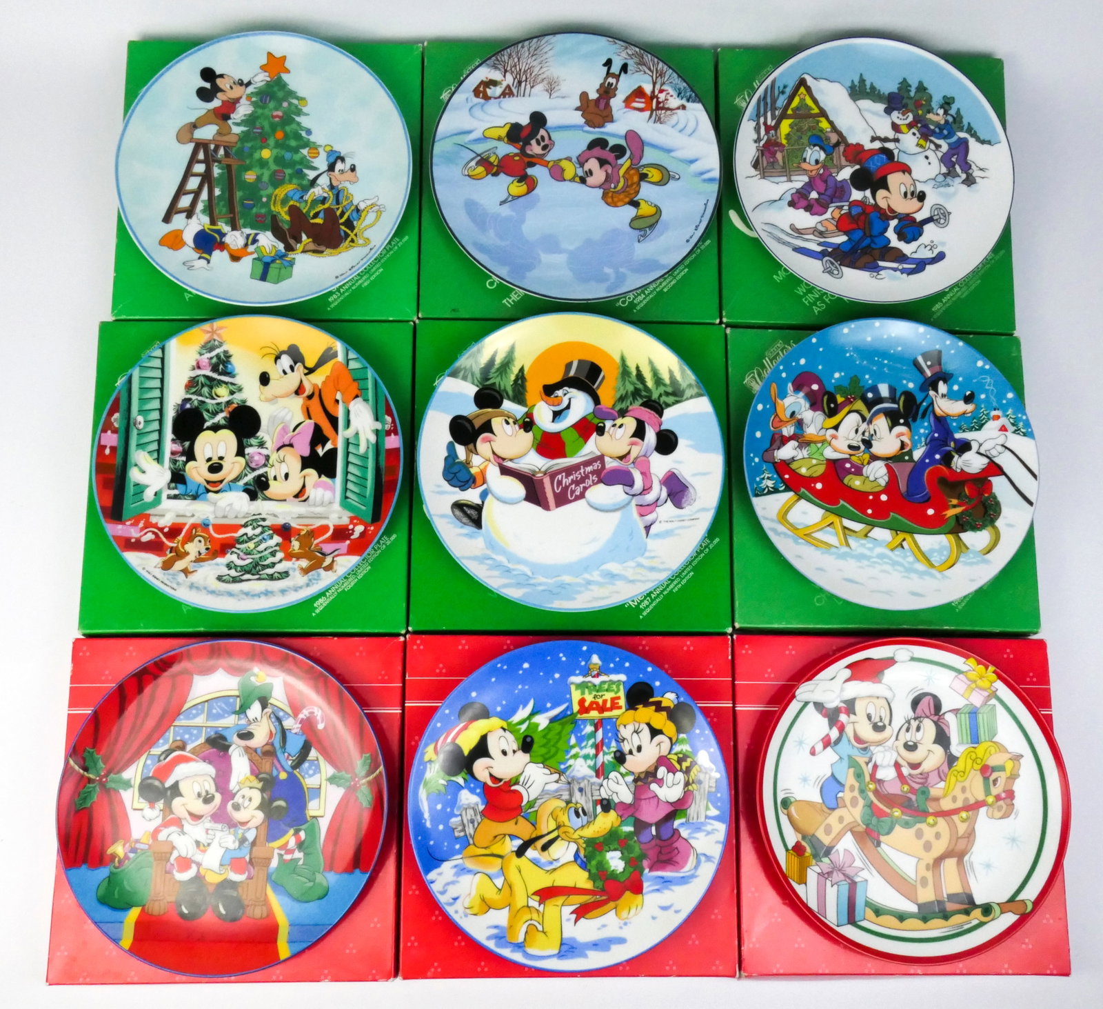 Nine Schmid Walt Disney Christmas Plates: Nine Schmid Walt Disney Christmas limited edition plates from 1983-1991 with boxes and certificates of authenticity. Wear on boxes. Size: 7.5"dia