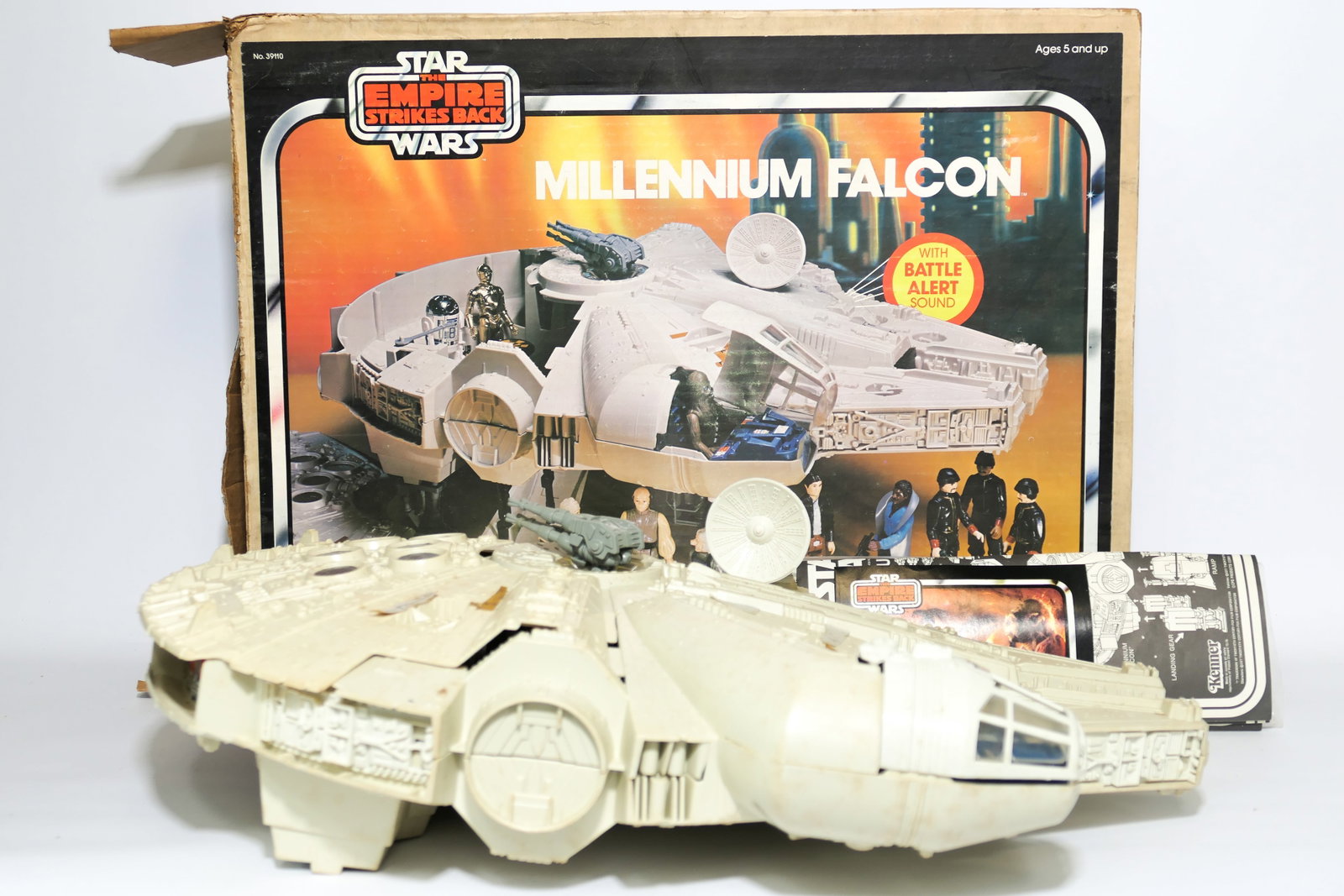 Kenner Star Wars Empire Strikes Back Millennium Falcon: 1978 Kenner #39110 Star Wars Empire Strikes Back Millennium Falcon with original box and appears complete. Box shows heavy wear. There is staining and discoloration and some stickers peeling. Size: 16
