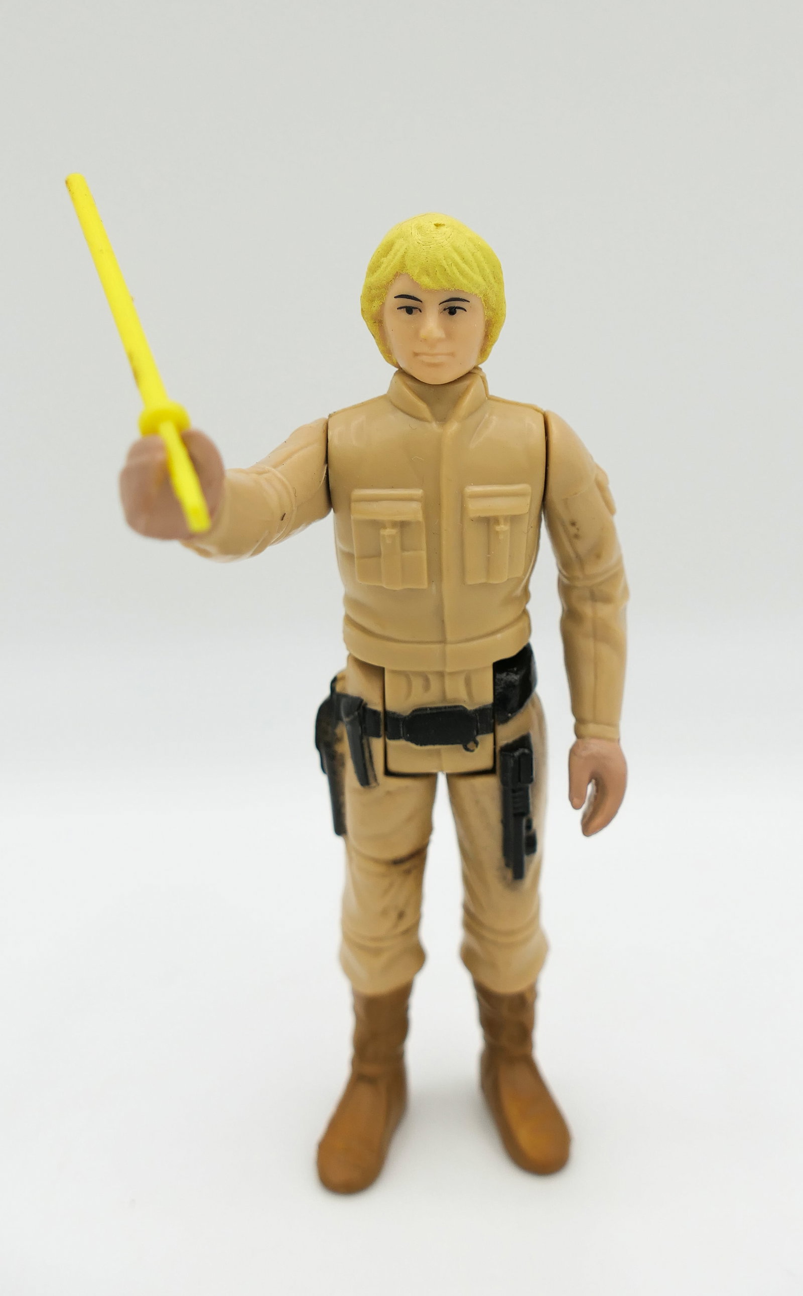 1980 Star Wars Luke Action Figure: 1980 Kenner Star Wars 4 inch action figure Luke Skywalker in Bespin outfit with lightsaber. Size: 4"h