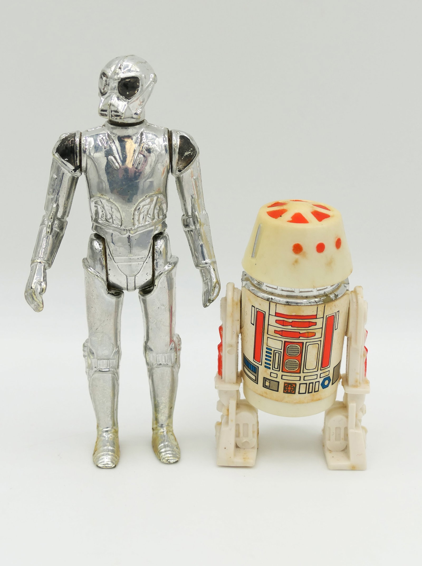 1978 Star Wars Action Figures: Two 1978 Kenner Star Wars 4 inch droid action figures including R5-D4 (some discoloration) and Death Star Droid (some color loss). Size: 4"h