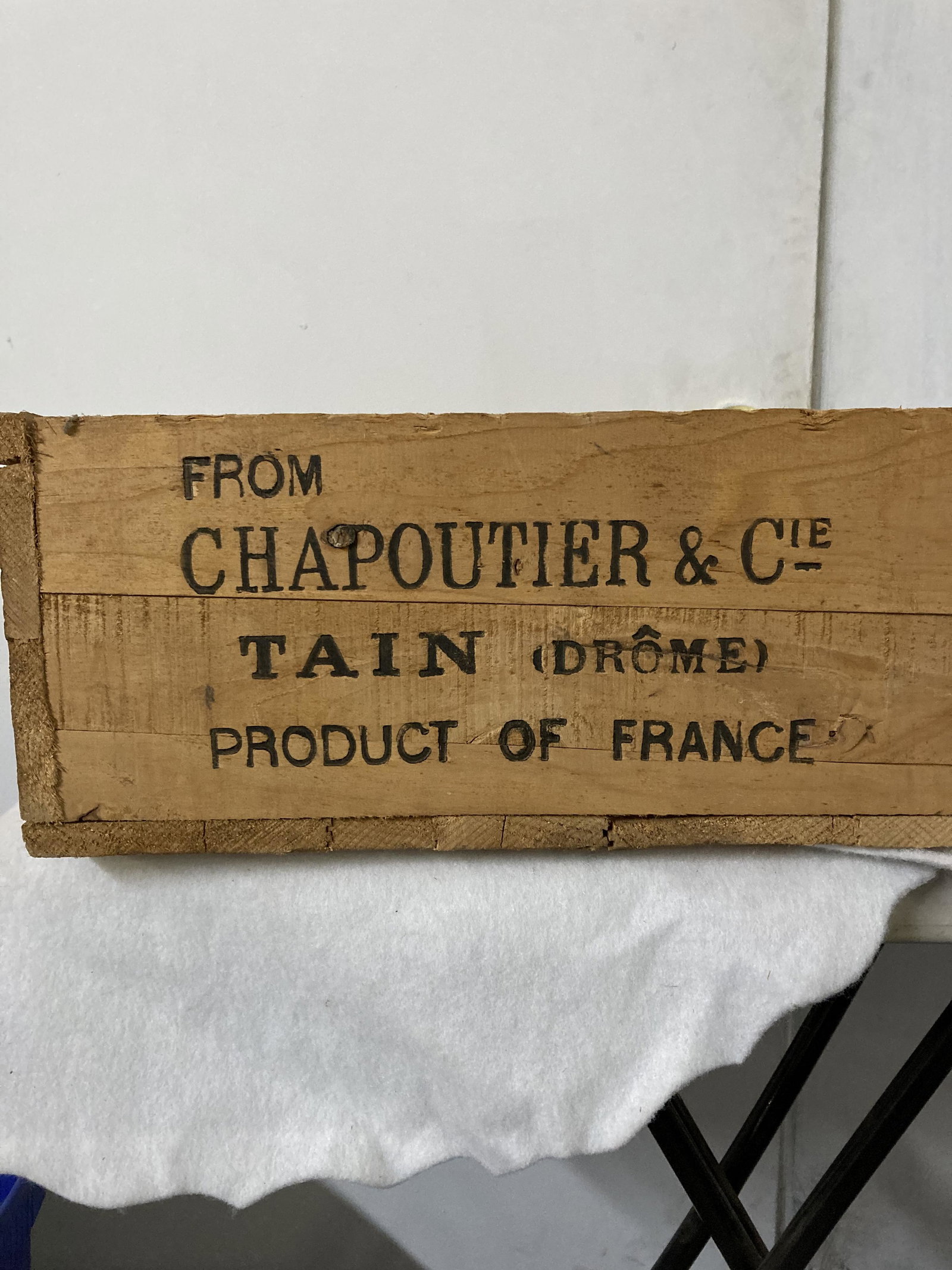1943 Rhone Pink Wine Crate - Chapoutier France: 1943 Rhone Pink Wine Crate - Chapoutier, France. For Johnny Barton & Co. Stamford CT. Letting is clear, Some markings. Holds 12 bottles. Meas 20"l x 7"h x 15 1/4"w. Nice condition. No broken boards.