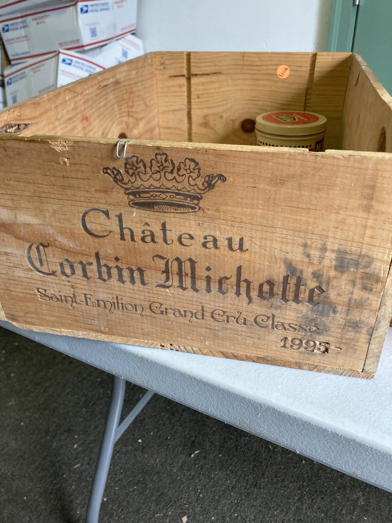 Vintage Wooden Boxes & Advertising: Lot Includes a Stuffed Prunes advertising box, Wyler's Mint Leaf Tin, Mothine Tin, an oak recipe file, and Chateau Corbin Michotte French Wine crate dated 1925 measuring approx. 7" h x 20" l x 13" w.
