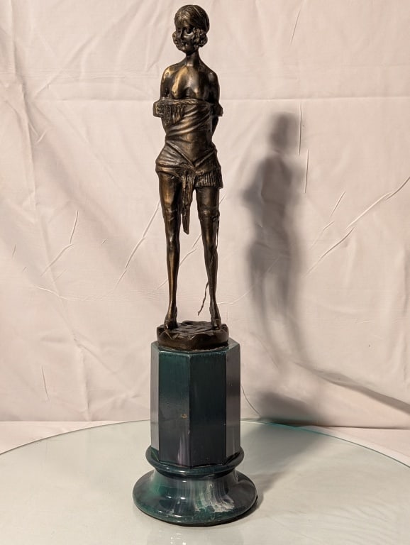 Woman in Bondage - Bronze on Marble Base: Woman in Bondage - Bronze on Marble Base Possibly a Bruno Zach (1891-1935) - similar "The Riding Crop". Depicts female figure holding a whip or similar wrapping around the leg. No markings, Nicely pat