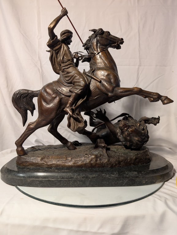 Warrior, Slaying Lion - Bronze A. L. Barye: Warrior Slaying Lion - Bronze by Antoine Louis Barye during the Oriental Art Movement. during the 19th century. Marble green base. Magnificent piece. Near mint condition. Meas. 18"h x 20"w x 12"d.