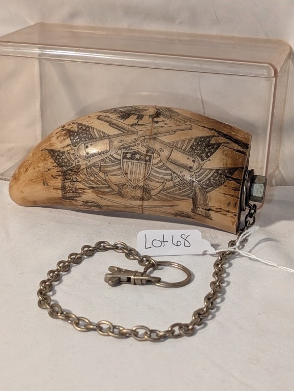 Whale's Tooth Scrimshaw - USA Patriotic Design: Whale's Tooth Scrimshaw - USA Patriotic Design. Made in El Paso TX. Reproduction. Depicting American Eagle, Buffalo Horns, Pistols and the American Flag on one side, Stage Coach scene on the