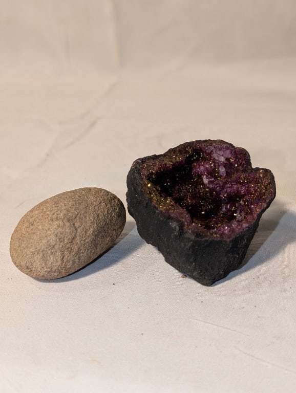 Geodes - Pair, 1 Nodule, 1 Exposed: Geodes - Pair, 1 Solid, 1 Exposed. Nodule is egg shaped, meas. 2"h x 1"r. The other, violet and gold quartz cluster, meas. 2 1/4" x 2 1/4 x 1 1/2".