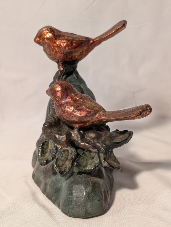 Birds on a Rock Sculpture / Door Stop / Bookend: Birds on a Rock Sculpture / Door Stop / Bookend. Modeled in the Georgia Gerber essence, sculpture shows 2 gilded birds on a marble rock base. Not signed. Meas. 5 1/2h x 3 1/4"w x 4 1/4"d.