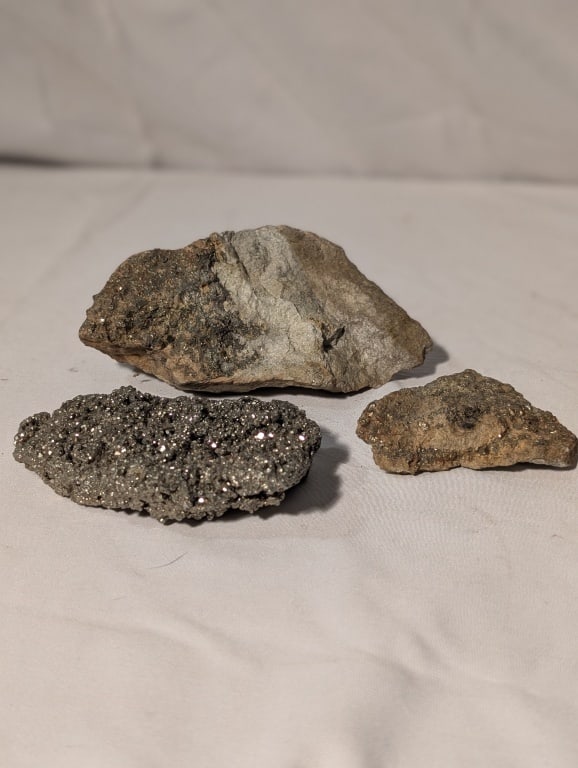 Pyrite and Mixed Stone /Collection - 3 pcs: Pyrite /Collection - 3 pcs. Varying colors and sizes. Large meas. 4 1/2"h x 2 1/4"w x 3 1/4"d. Med meas. 4 1/2"h x 2 3/4"w x 1 1/2"d. Smallest mea. 3"h x 2"w x 1/2"d.