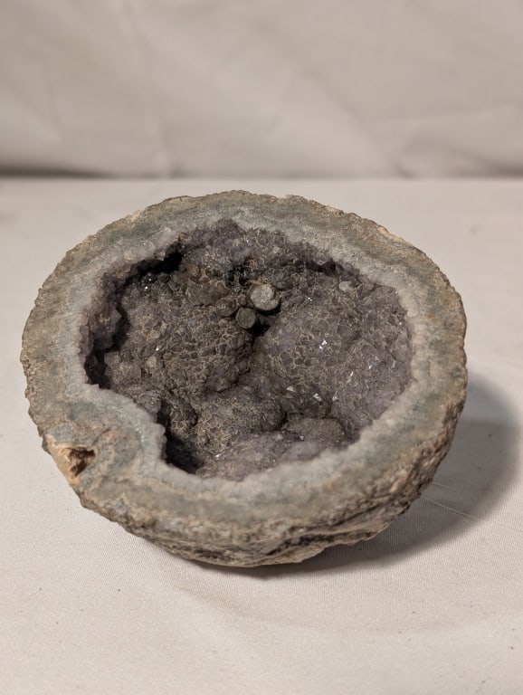 Amethyst Geode "Moon Rock": Amethyst Geode "Moon Rock" shape in appearance. Meas. 2"h x 3 1/2"w x 4".