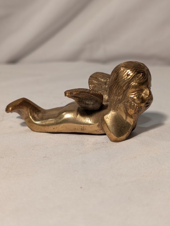 Angel Cherub Laying Down- Brass Figure: Angel Cherub - Laying Down- Brass Figure. Meas. 2"h x 2 3/4"w x 4 1/2"l.