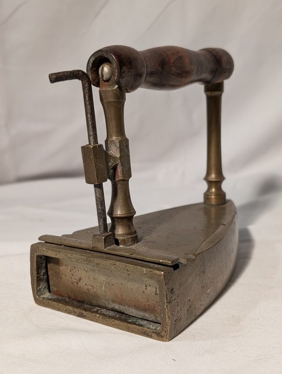 Sadiron w/ Allen Wrench to Open Door - Brass: Sadiron w/ Allen Wrench to Open Removable Door. Access to area for coals or hot stones. Wooden handle. Meas. 6 1/2" x 3 3/4"w x 5 3/4". Nicely patinated. Door and opener in tact.