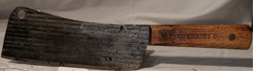 1920s Old Hickory Cleaver TruEdge Ontario Knife Co: 1920s "Old Hickory" Cleaver - Wooden Handle. Blade set w/ ridges, eye hole. Shows wear, discoloration and patination on handle. Made in USA. TruEdge Ontario Knife Co. Meas. 12"l x 2 3/4"w x