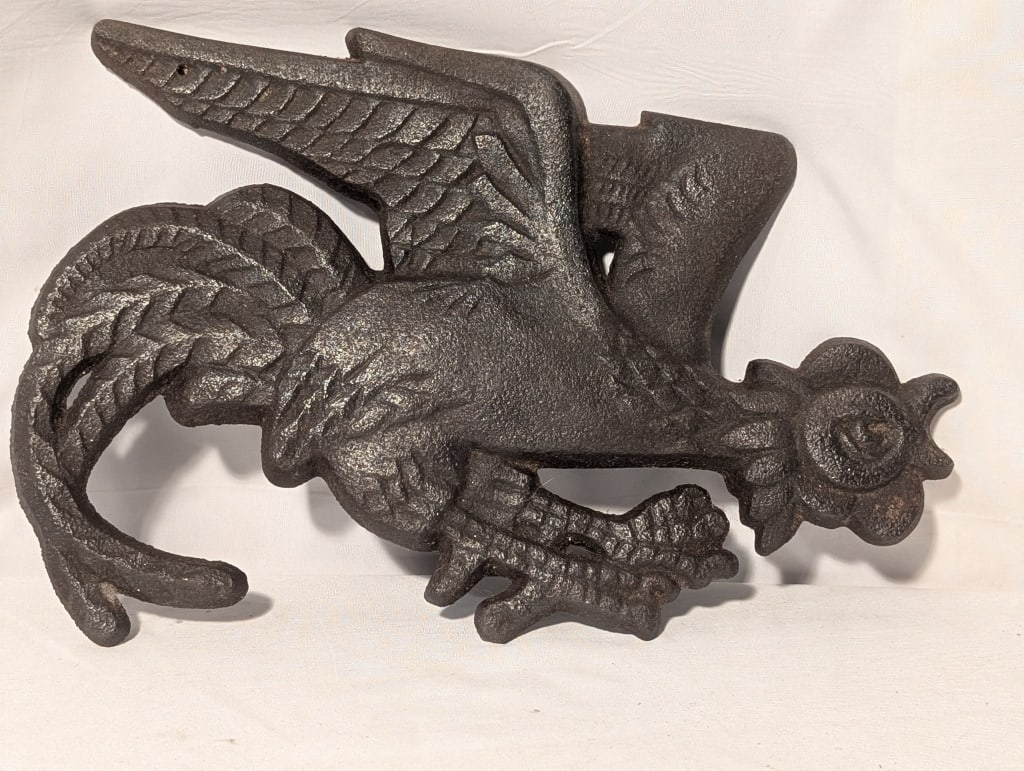 "Angry Rooster" Wilton Art Deco Wall Hanging CI: "Angry Rooster" Wilton Art Deco Wall Hanging Cast Iron. Maker's mark on back. Nice detail. Meas. 6'h x 9 1/2"w.