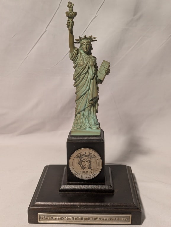 Lady Liberty Bicentennial Statue - Danbury Mint: Lady Liberty Bicentennial Commemorative Statue - Danbury Mint 1886-1986. Plaque at base reads "Plated w/ copper from actual Statue of Liberty." Patinated similar to the original. Medallion on