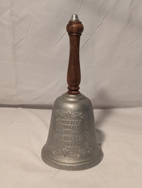 Gorham Bicentennial Commemorative School Bell: 1976 Bicentennial Commemorative School Bell -Pewter bell, wood handle. Made by Gorham. Raised relief shows "From every mountain, let freedom ring.". EIG AH-13. Meas 10"h x 4 1/2"r