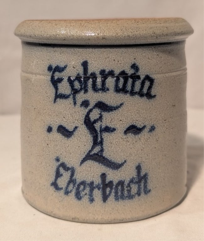 Rowe Pottery Blue Gray Stoneware Crock: Rowe Pottery Blue Gray Stoneware Crock. "Ephrata "E" Eberbach" on front. They are sister cities - Ephrata, PA USA, and Eberbach, Germany. Maker's mark stamped on reverse. Like new. Cambridge, WI. Meas