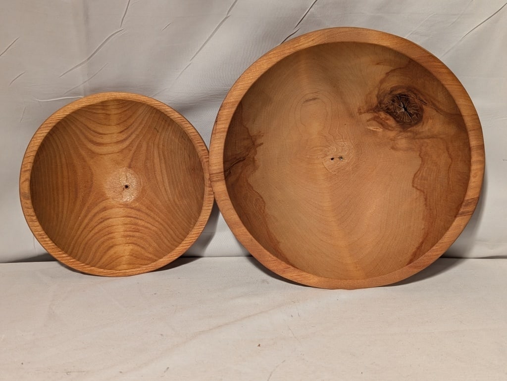Alaskan Wood Bowls (2) - Great Alaskan Bowl Co: Alaskan Wood Bowls (2) - Great Alaskan Bowl Co, Fairbanks, AK. Each bowl is hand turned. Each has a hole in the center bottom. Sm meas. 6 1/4"h x "r 1 3/4"r Lg meas: 8 3//4"h x 2 3/4"r