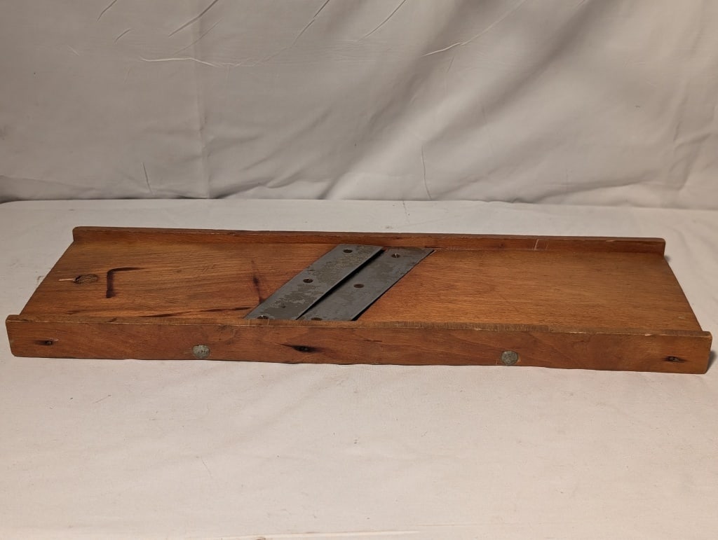 Antique Wooden Slaw Board Double Blade, Marked: Antique Wooden Slaw Board, Double Blade, Marked with an "H" in a diamond. Primitive kraut board. Meas 18"h x 6"w x 1"d. Shows use. Nice piece.