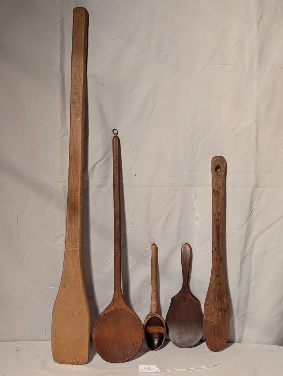 Primitive Wooden Cooking Spoons & Spatulas (5): Primitive Wooden Cooking Spoons & Spatulas. 5 pieces. 1 long handle cauldron stirring spatula. Meas. 30"l x 3 1/4"w 1 long handle spoon w/ large circular bowl, Meas. 20"l x 4 1/4"w. 1 spatula