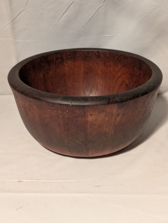 Dansk Int'l Wooden Bowl w/ Visible Mortise: Dansk Int'l Wooden Bowl w/ Visible Mortise (indentation on bottom of bowl when using a lathe). Made out of Teak in Malaysia. Very nice patina and size. Used primarily for making dough or serving.
