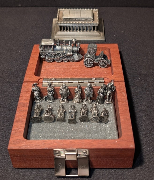Miniature Pewter Figure Group w/ Lincoln Memorial: Miniature Pewter Figurine set featuring the Lincoln Memorial meas. 1 1/4"h made by Bates & Klinke. All other figures are smaller. Figures include buggy, train engine, people doing various activities