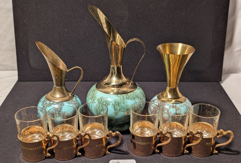 Delft Pitcher, Serpent Shot Glasses & More: Delfts Enamel/Brass Pitcher (Holland), Enamel/brass pitcher (Portugal), meas. 8 1/2" x 4"r., 4 shot glasses with serpent handles, top glass, gold plate bottom. Vase is unmarked. All have the same styl