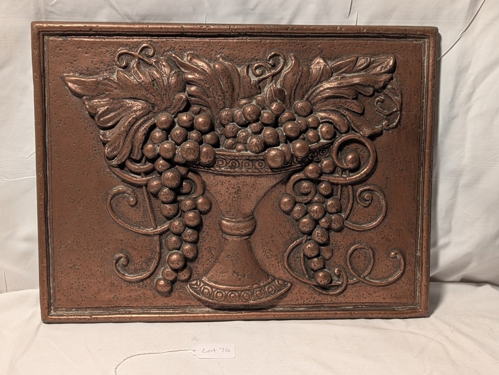 Marble Relief Back Splash w/ Copper Grapes Design: 3D Marble Relief Back Splash w/ Grapes in Pedestal Bowl w/ flourishes. Copper color over a marble base. Glue residue on reverse. Minor chipping around edges due to age and wear. Meas. 12"h x 16"w x 1"